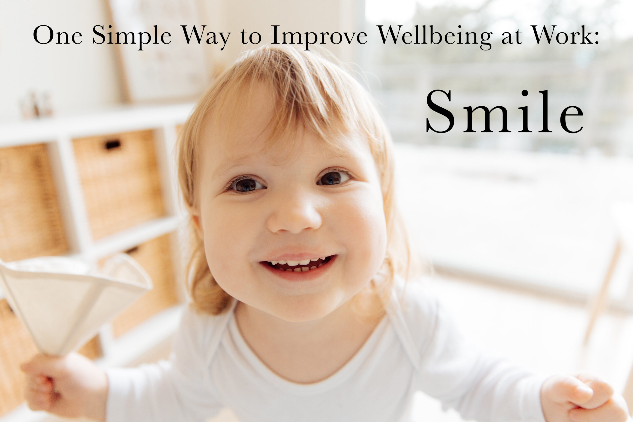 One Simple Way to Improve Wellbeing at Work: Smile